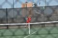 Photograph: [Carolina Maso swings racket backhanded]