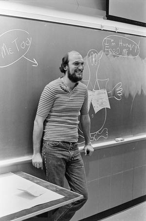 Primary view of object titled '[Jerry Sala at the Blackboard in Lamar University]'.