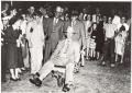 Photograph: [A Mayor Being Pushed in a Wheelbarrow]
