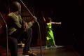 Photograph: [Performer in green dress dancing]