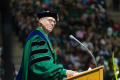 Primary view of [UNT Provost Finley Graves on the stage during the Bachelor's Commencement ceremony]