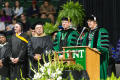 Photograph: [President Neal Smatresk and Other Faculty at Commencement Ceremony]