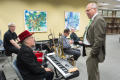 Photograph: [UNT's President Smatresk Talking with Carl Finch of Brave Combo]