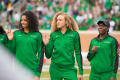 Primary view of [Women's Basketball team at Homecoming football game]