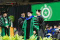 Photograph: [Ph.D Candidate Being Presented with Doctoral Hood, 4]