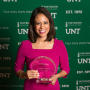 Photograph: [Cynthia Izaguirre holding up her award]