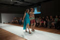 Photograph: [Fashion design student walking runway with male model]