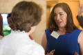 Photograph: [Candace Carlisle speaking with Sue Mayborn at reception]