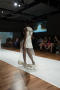 Photograph: [Model walking down runway during ArtWear]