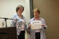 Primary view of [Marcia Trauernicht and recipient of certificate]