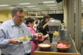 Photograph: [CSLA conference guests getting lunch and refreshments]