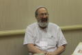 Primary view of [Rabbi David Zaslow sitting down]