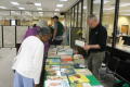 Photograph: [CSLA conference attendees browsing children's books]