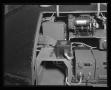 Primary view of [Photograph of a closeup view of the mechanical and electrical components inside a UH-1B Iroquois helicopter]