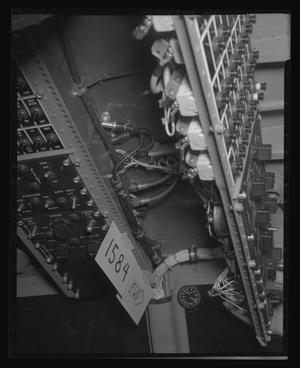Primary view of object titled '[Photograph of controls on the ceiling of a UH-1B Iroquois helicopter]'.