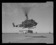 Photograph: [Photograph of a UH-1B Iroquois helicopter with an M-6 armament subsy…