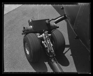 Primary view of object titled '[Photograph of wheels on the landing skid of an aircraft]'.