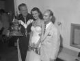 Photograph: [Horace Heidt, Barbara Page and an unknown man at Philip Morris night]