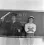 Photograph: [Chris Hansen graduation and baseball cap]