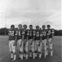 Photograph: [Seven football players in a line, 2]