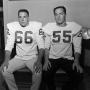 Photograph: [Two football players with shoulder pads]