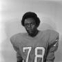 Photograph: [Football player sitting for a portrait, 35]