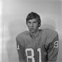 Photograph: [Football player sitting for a portrait, 38]