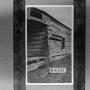 Thumbnail image of item number 1 in: '[Photograph of a log cabin #1]'.