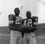 Photograph: [Two football players holding a ball, 5]