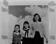 Photograph: [Three girls and clouds]