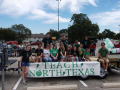 Photograph: [TNT members on float]