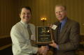Photograph: [Donnis Bagget handing out plaque award to Brice Cherry]