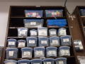Primary view of [Boxes full of small items on shelves]