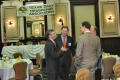 Photograph: [TDNA conference guests conversing in breakfast hall]