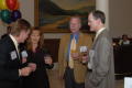 Thumbnail image of item number 1 in: '[TDNA conference guests talking over drinks]'.
