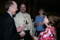 Photograph: [John and Donna Roberts talking with guests at reception]