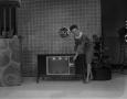 Thumbnail image of item number 1 in: '[Bobbie Wygant and a television set]'.