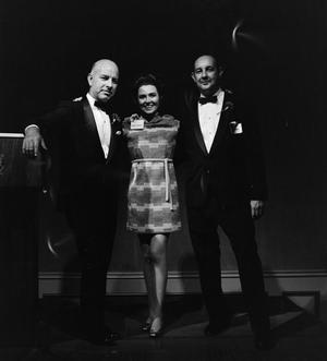 Primary view of object titled '[Bobbie Wygant with two men]'.