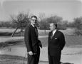 Photograph: [Unknown man and Gene Sanzon at a golf course]