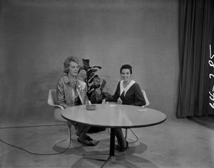 Primary view of object titled '[Bobbie Wygant and guest on Dateline]'.