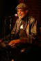 Photograph: [Photograph of Melvin Van Peebles on a stage at 24-Hour Film Feast]