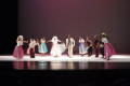 Primary view of [Photograph of dancers lined up on stage to take a bow]