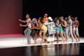 Primary view of [Photograph of dancers lined up on a stage]
