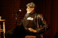 Photograph: [Photograph of the director Melvin Van Peebles speaking at a film fes…