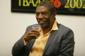 Primary view of [Vondie Curtis Hall smiles while holding cup]