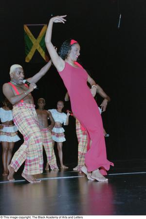 Primary view of object titled '[Dancers performing onstage during Ashe Caribbean event]'.