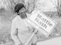 Photograph: [Photograph of Mattie Nash and her City Council sign, 2]