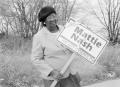 Photograph: [Photograph of Mattie Nash and her City Council sign]