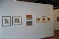 Photograph: [Photograph of an African gallery wall, featuring seven art works]