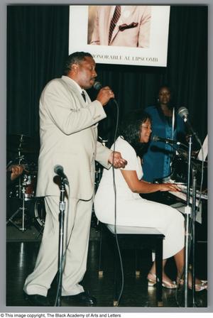 Primary view of object titled '[Photograph of Cavin Yarbrough and Alisa Peoples performing on stage]'.